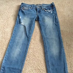 Distressed blue jeans